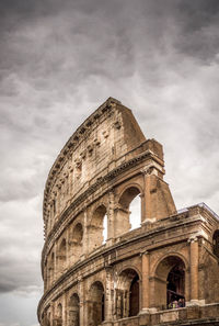 Low angle view of historical building against sky roman colloseum