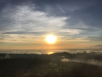 Scenic view of mountains against sky during sunset