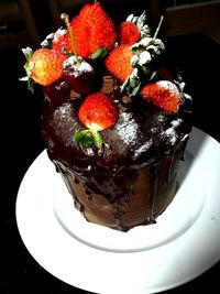 High angle view of strawberries in plate