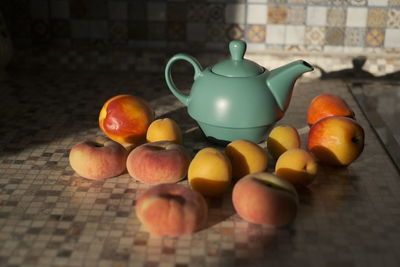 Close-up of oranges on table at home