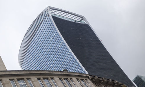 Low angle view of skyscraper against sky