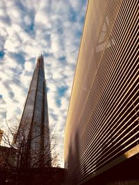 Low angle view of skyscraper against sky