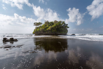 Scenic view madasari beach with blue sky