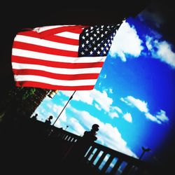 Low angle view of flag against sky