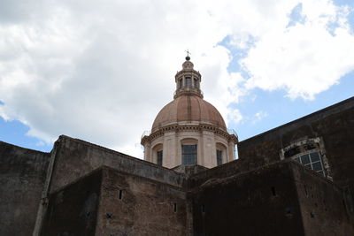 Low angle view of old building against sky