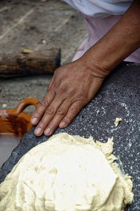 High angle view of man preparing food