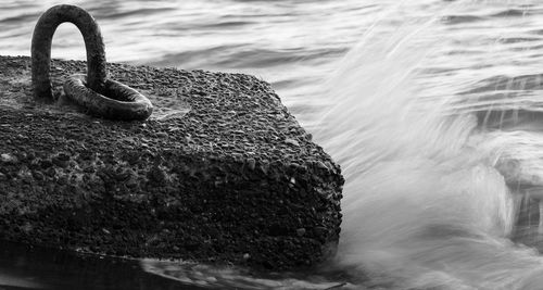 Close-up of rock on sea shore