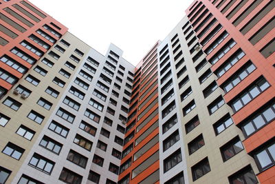 Low angle view of office buildings against clear sky