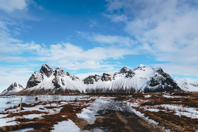 Snow covered mountain against sky