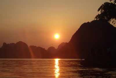 Scenic view of sea at sunset