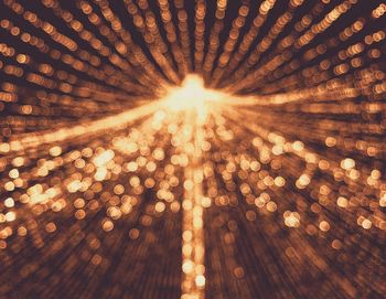 Sunlight streaming through illuminated lights