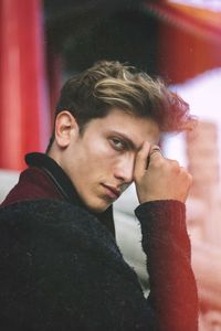 Portrait of young man looking away