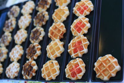 Close-up of baked waffles in trays