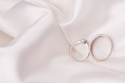 High angle view of wedding rings