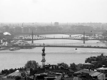 High angle view of bridge and buildings against sky