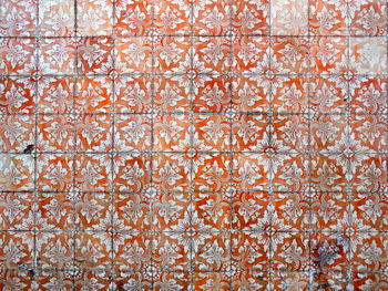 Red floral patterned wall. lisbon portugal