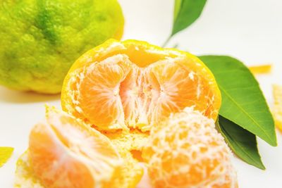 Close-up of orange slices on table