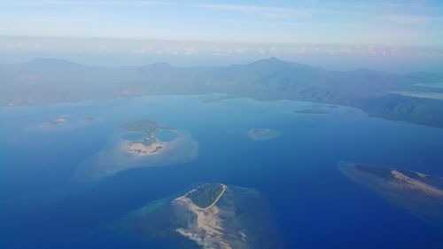 Aerial view of mountains against sky