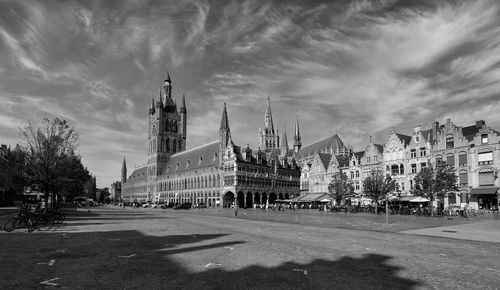 Panoramic view of city buildings against sky