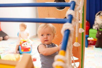 Cute boy playing with toy