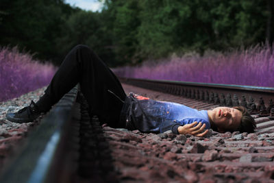 Low section of two people on tiled floor