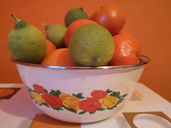 Close-up of fruits in bowl on table