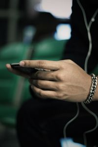 Close-up of hand holding smart phone
