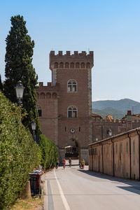 Embattled tower of the medieval castle at the entrance to the village of bolgheri.