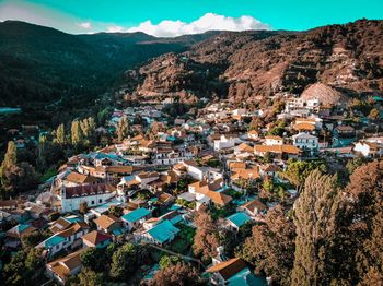 High angle view of townscape and mountains