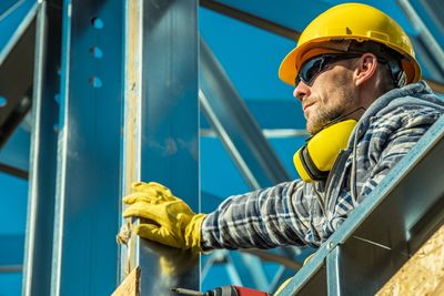 Man working with yellow umbrella