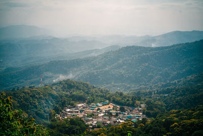 High angle view of townscape against mountains