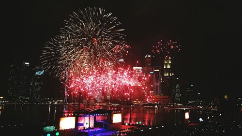 Firework display at night