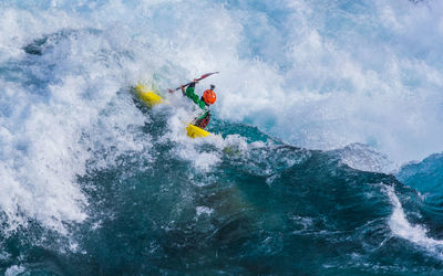 Kayaker descending the futaleufu river, a class 5 river in patagonia