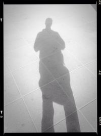 Shadow of man on wall