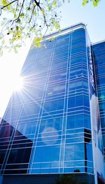 Low angle view of office building against sky