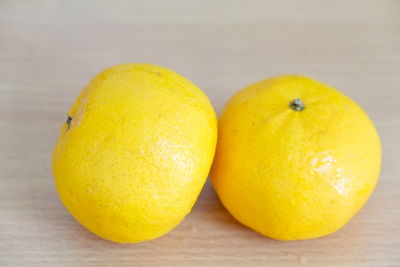 Close-up of oranges on table