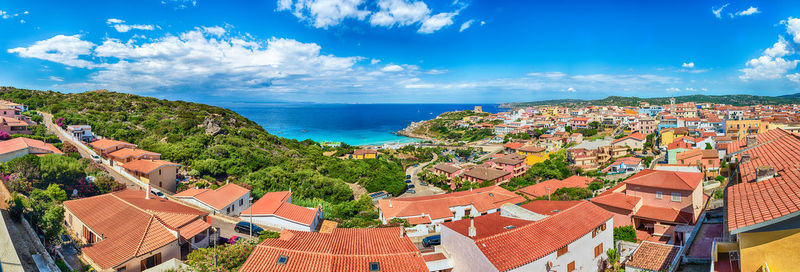 High angle view of townscape against blue sky