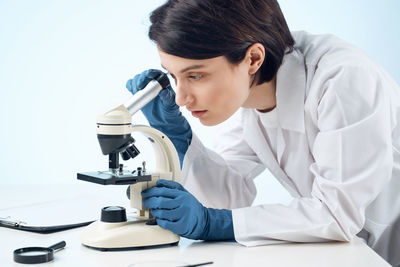 Doctor examining patient in clinic