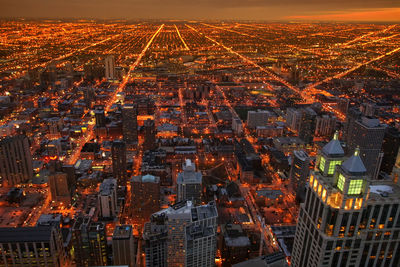 High angle view of city buildings at night