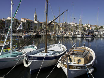 Boats moored in harbor