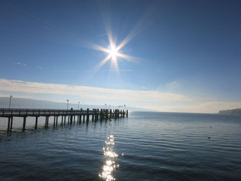 Scenic view of sea against blue sky