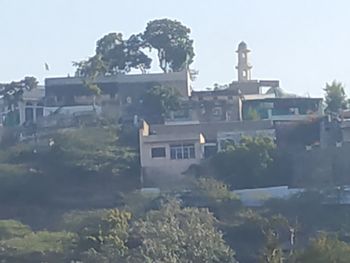 Buildings against clear sky