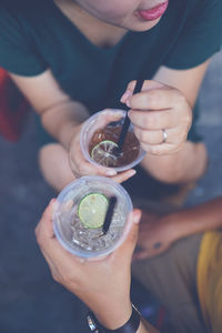 High angle view of female friends having drink