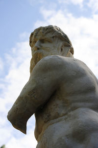 Low angle view of statue against sky