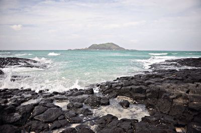 View of calm sea against sky