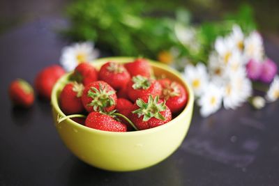 Close-up of red fruits on table