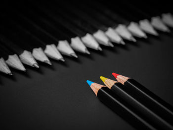 High angle view of pencils on table