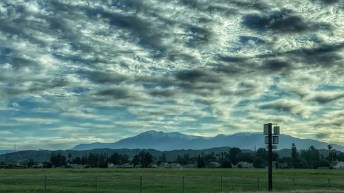 Scenic view of field against sky