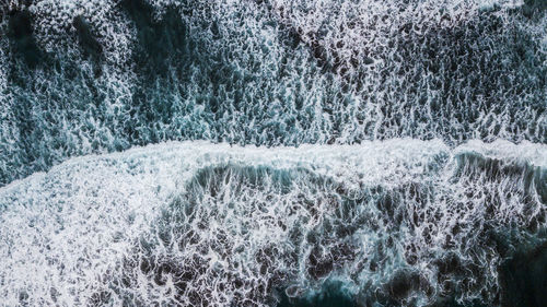 Full frame shot of water flowing over sea