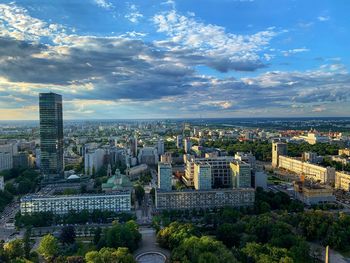 High angle view of buildings in city against sky